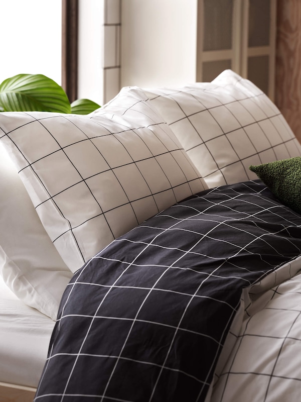 Patterned bedding and pillowcases. 